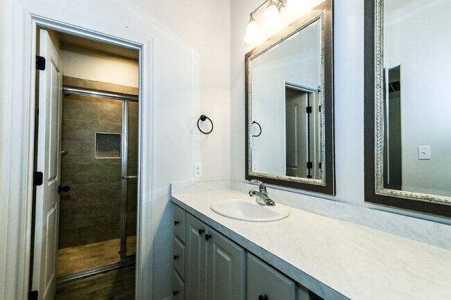 Building Photo - First Full Month's Rent Free! New Cooper M...