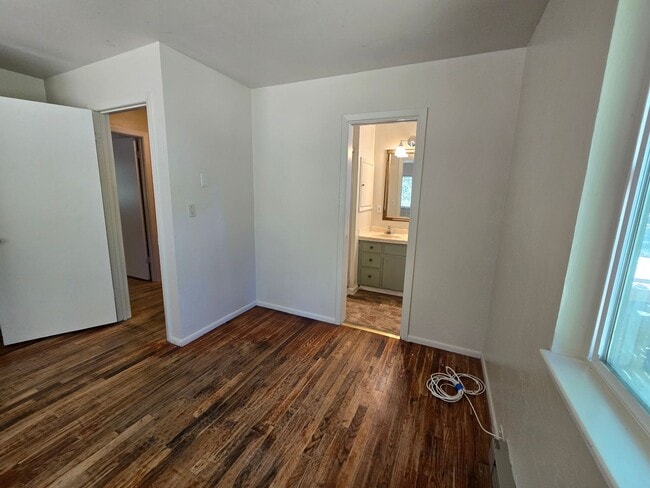 Building Photo - charming 3-bedroom, 2-bathroom home with l...