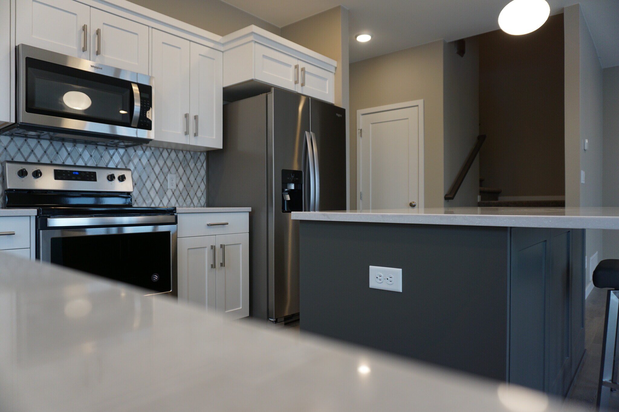 Large, bright kitchen. (Photos are of similar unit with similar finishes.) - 3811 Stacy Drive