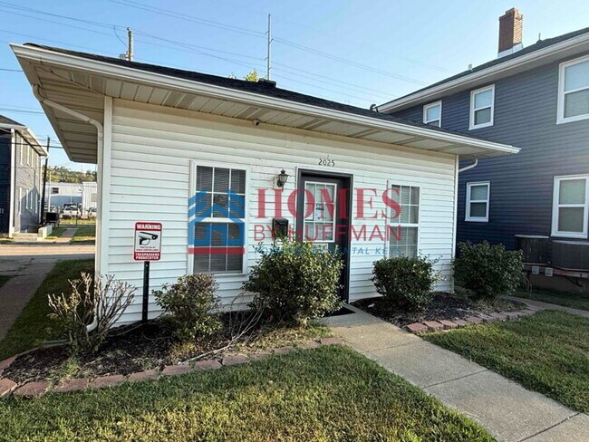 Building Photo - One Bedroom Apartment | Laundry Facility | Utilities Included