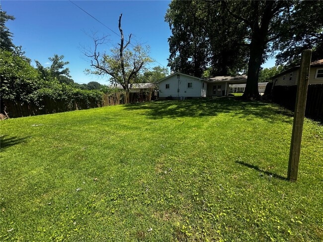Building Photo - 6705 Lightwood Dr