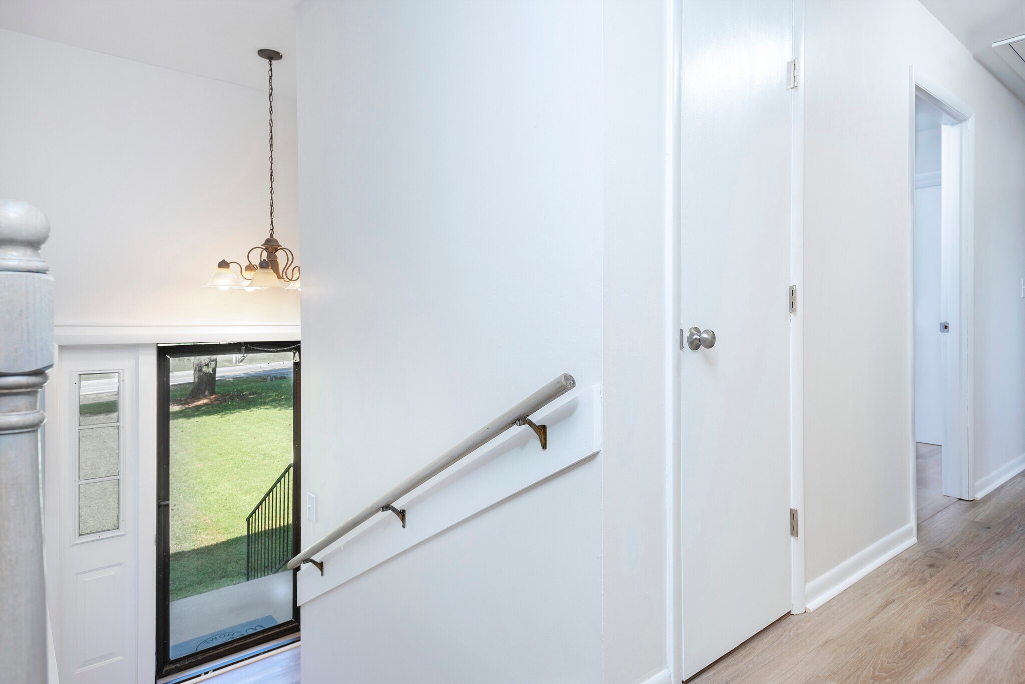 Stair down to main entrance from living room - 5760 Saundersville Rd