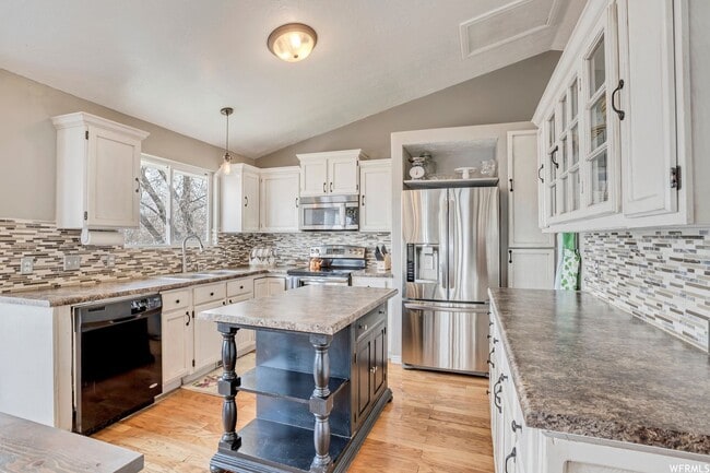 Building Photo - Spacious West Jordan Home Backing to Duck Pond & Trails | Large Yard + Garage