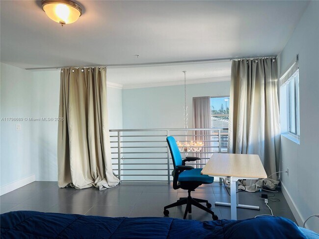 Building Photo - 7700 Collins Ave