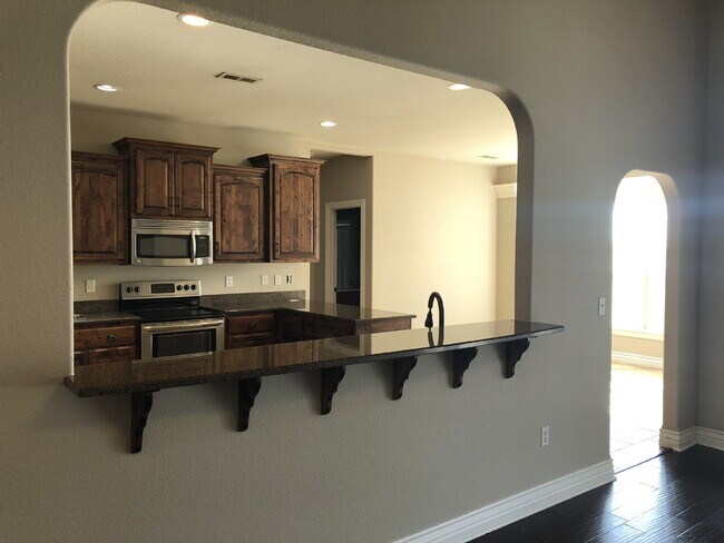 Building Photo - 4BR / 3Car garage / Fully fenced in backyard - Stunning property