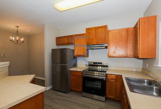 Building Photo - Move in before January 31st and choose your reward: a $250 Amazon Gift Card or a 55" Smart TV!