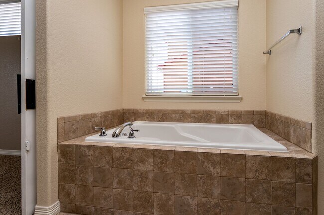 Building Photo - Spacious 5-Bedroom Home with Finished Base...