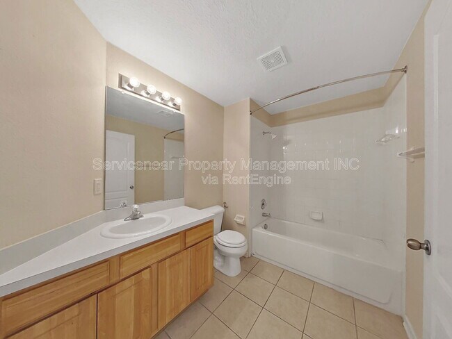 Building Photo - 7603 Crescent Palm Dr