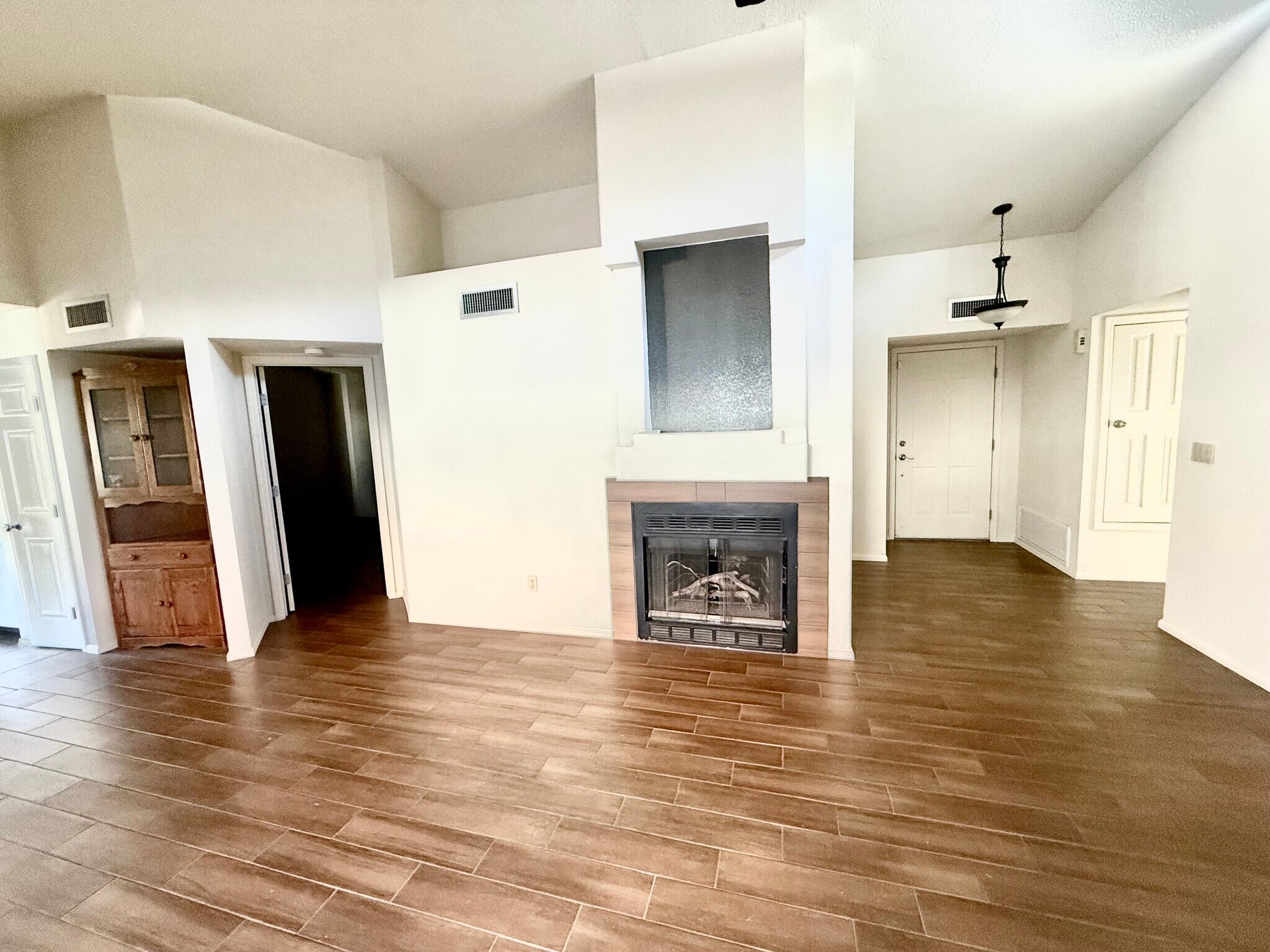Living room with fireplace - 200 E Belcourte Pl