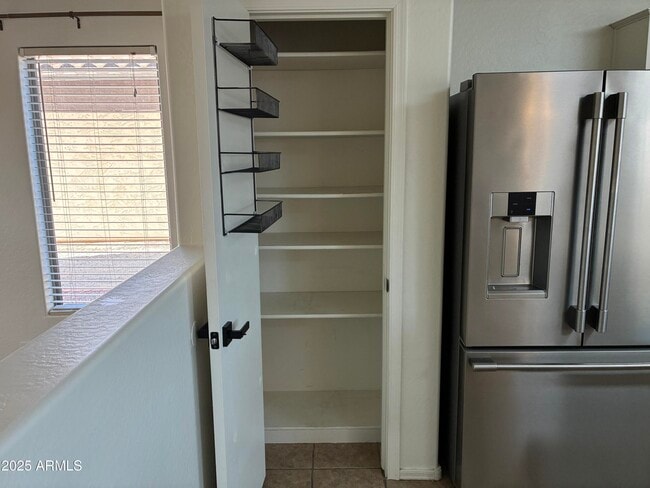 Building Photo - 7287 S Sunrise Way