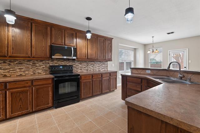 Building Photo - 10309 Colfax Dr