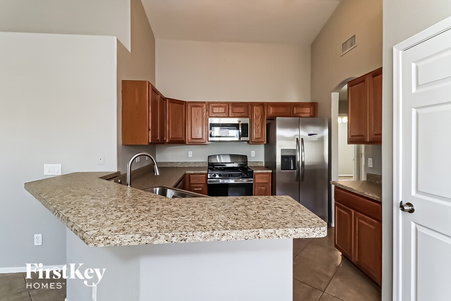 Building Photo - 8543 W Cherry Hills Dr