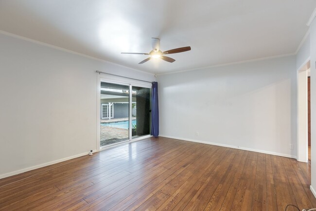 Building Photo - Spacious 5-Bedroom, 3-Bath Home with Pool ...
