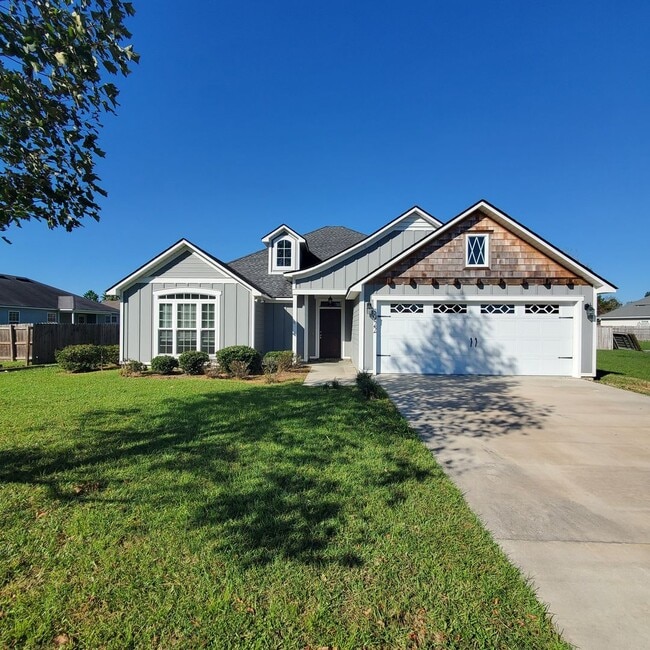 Primary Photo - Spacious 4-Bedroom Home with Modern Featur...