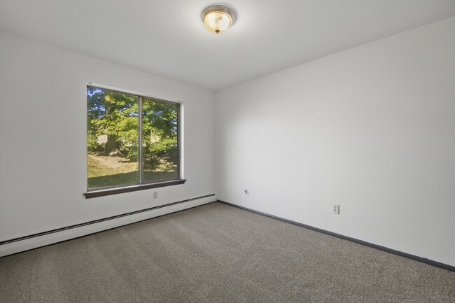 Building Photo - Large, updated, two bedroom available February first