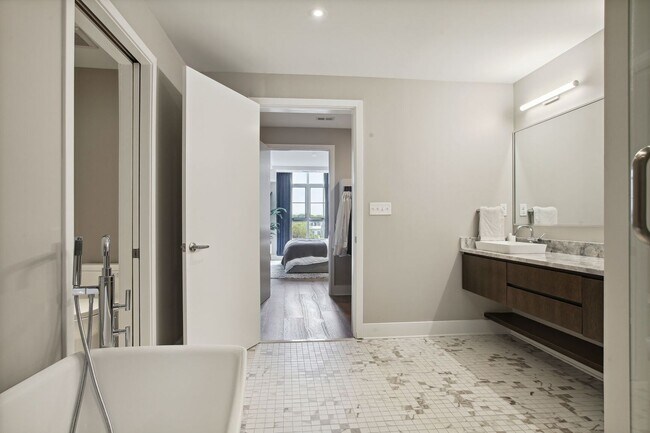 Building Photo - Elegant 2BR at The Adora | 1,500+ SF, Chef’s Kitchen & Garage Parking!