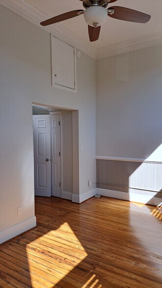 Bedroom photo showing closet, and storage cubby - 101 E Broad St