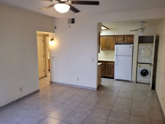 Ceiling fan in living room with open feel floor plan. - 5750 N Camino Esplendora