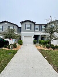 Building Photo - "Charming 3-Bed townhouse in a Gated Community has 2.5 Baths, 1650 Sq Ft 
– New Flooring and New ...