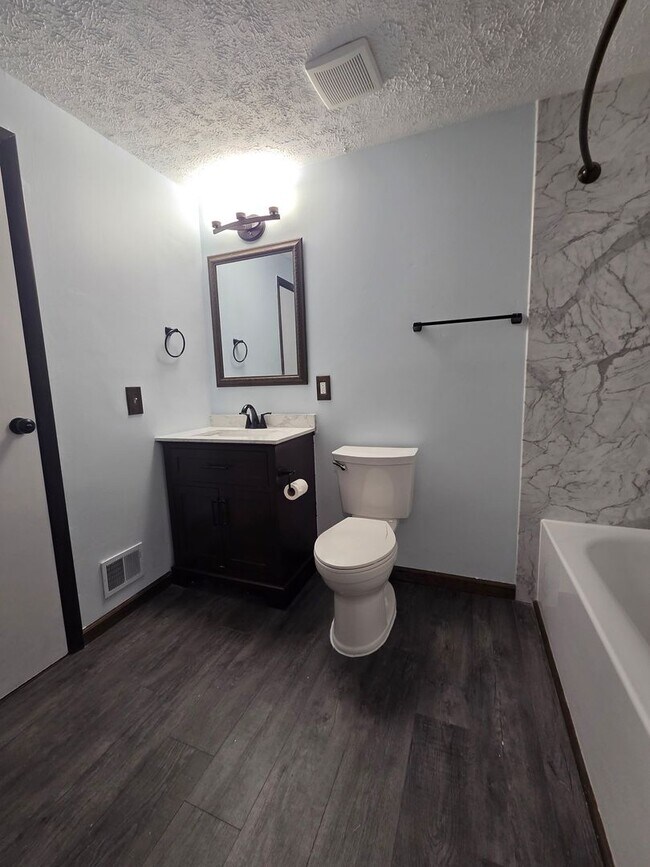 Building Photo - Serene Living in a Quiet Lakeside Community