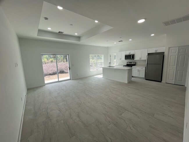 Building Photo - MODERN BRAND NEW RETREAT IN LEHIGH ACRES!