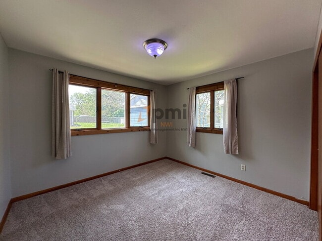 Building Photo - 6850 Van Buren Pl