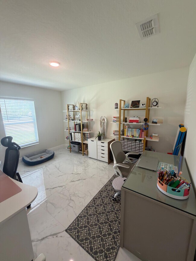 Building Photo - 5363 NW Perez Ct
