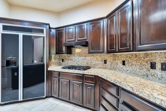 Building Photo - Experience luxury living in the prestigious Gainey Village!