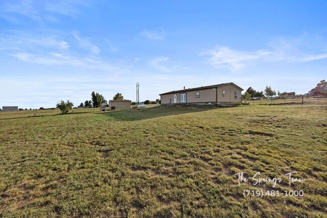 Building Photo - MODERN UPGRADES AND RURAL LIVING IN PEYTON