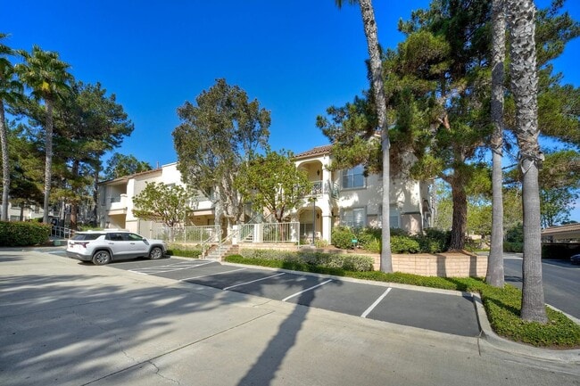 Building Photo - Coastal Living at Its Best – Upgraded 1BR Condo with Private Patio & Resort-Style Amenities