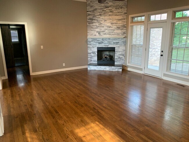Building Photo - Luxury Living! Beautiful Brick Home in Sango with 3 car garage.