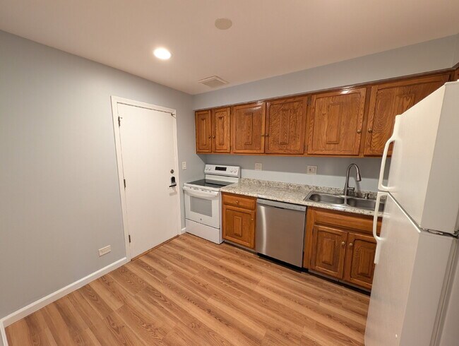 Building Photo - Beautiful 2BR/2BA Condo –  Swimming Pool, Fireplace, In-Unit Laundry, Parking + Storage