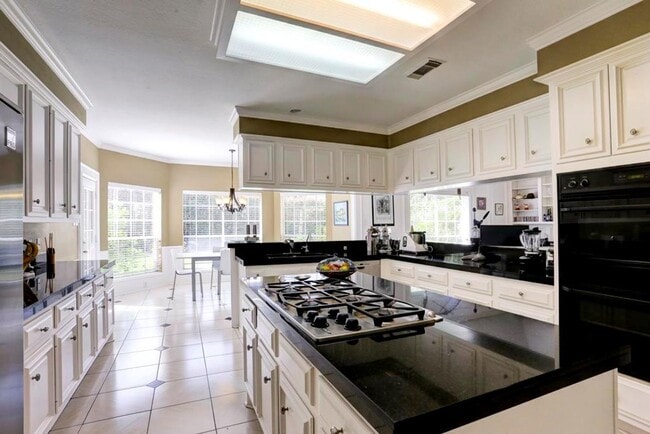 Building Photo - Spacious 5-Bedroom Lakeview Home with Pool...