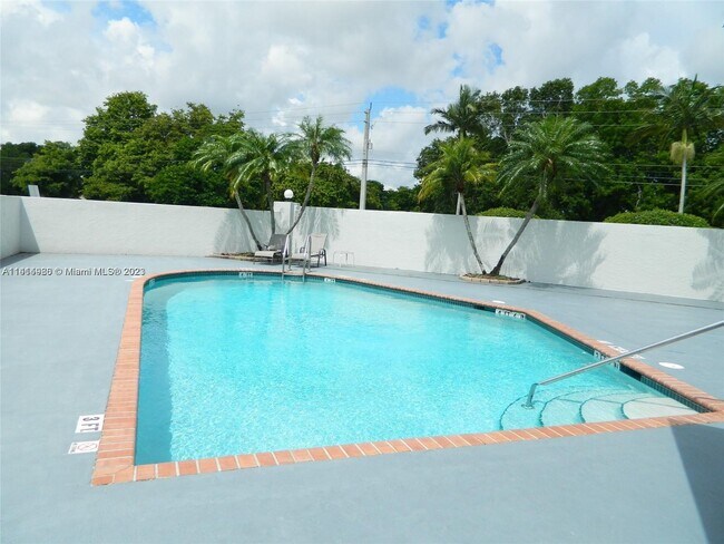 Building Photo - 6734 N Pine Island Rd