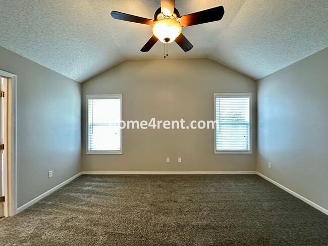 Building Photo - Beautiful Four-Bedroom Home with Three Car Garage, Wood Floors, Finished Basement and a Fenced Ya...
