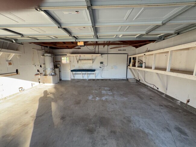 Building Photo - "Charming Riverside Retreat: Spacious 4-Be...