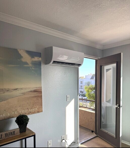 Building Photo - 8889 Caminito Plaza Centro