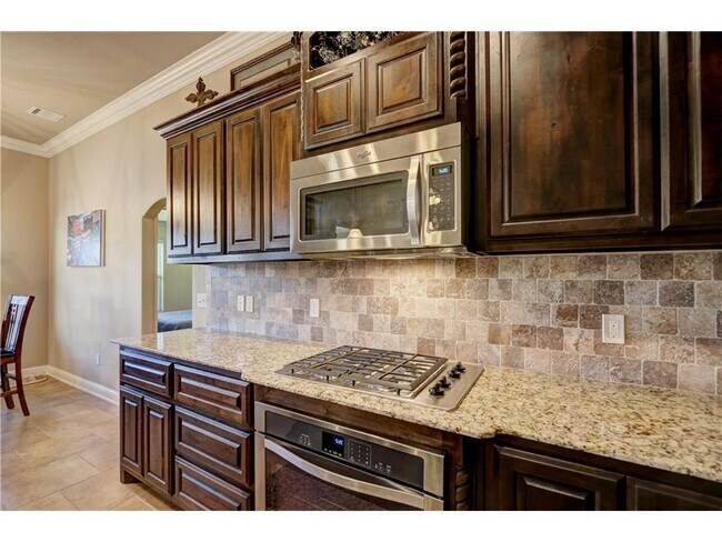 Building Photo - 4 Bedrooms/3Car/Storm Shelter-In Edmond Schools-Community Pool