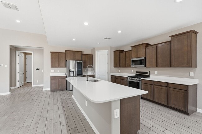 Building Photo - Spacious 5-Bedroom Home with Open Floor Plan & Private Backyard