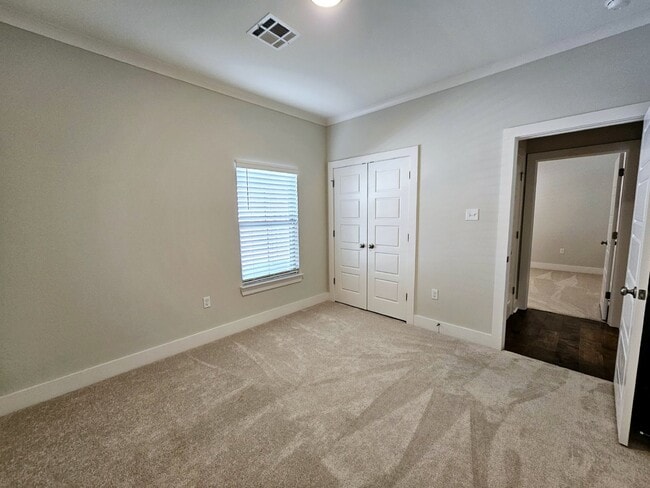 Building Photo - Stunning 4-Bedroom Waterfront Home with Granite Countertops and Hardwood Floors in The Sanctuary ...