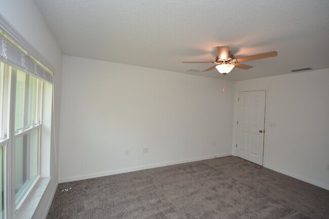 Building Photo - "Charming 3-Bedroom Duplex with Granite El...