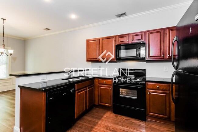 Building Photo - REDUCED! - NOW OFFERING FIRST FULL MONTH F...