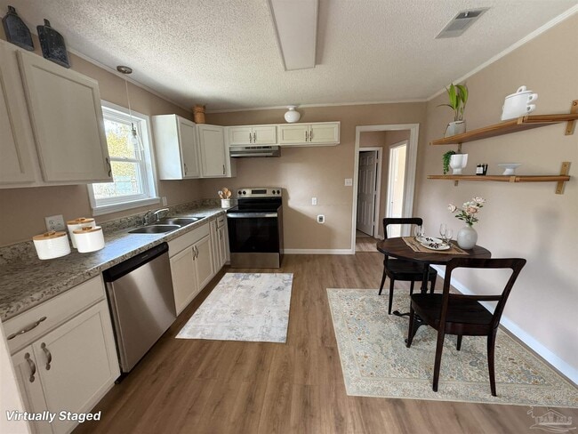 Building Photo - 7845 Le Jeune Dr