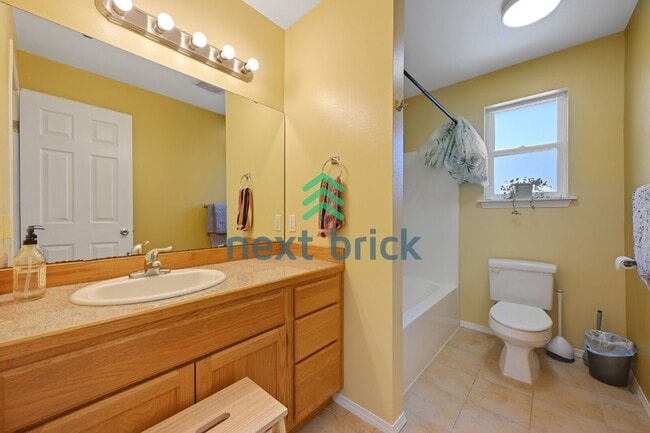 Building Photo - Discover Spacious Comfort: 4-Bedroom Gem with 2.5 Baths