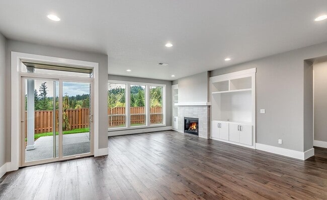 Building Photo - Bethany Stunner - 5 Bedrooms with Main-Level Bed & Bath, Modern Kitchen & Private Fenced Yard