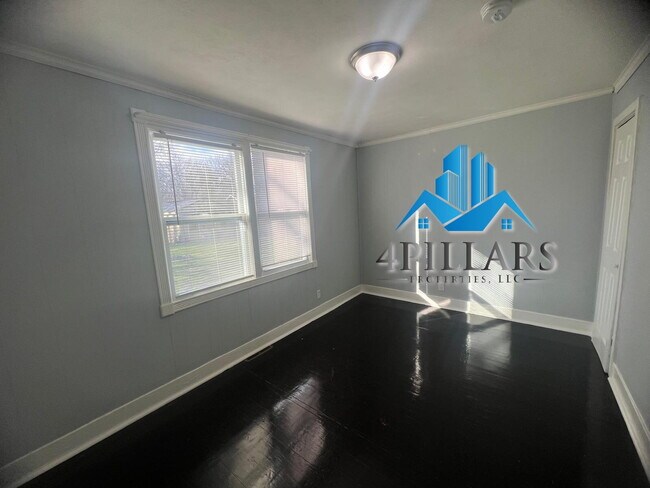 Building Photo - Charming 2 Bedroom Duplex in La Porte with Spacious Layout and Prime Location