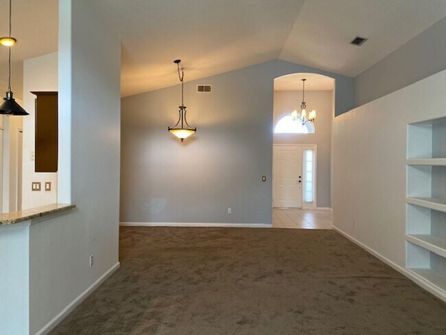 Building Photo - Lakefront 3-Bedroom Pool Home in Gated Com...