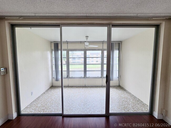 Building Photo - 6070 NW 64th Ave