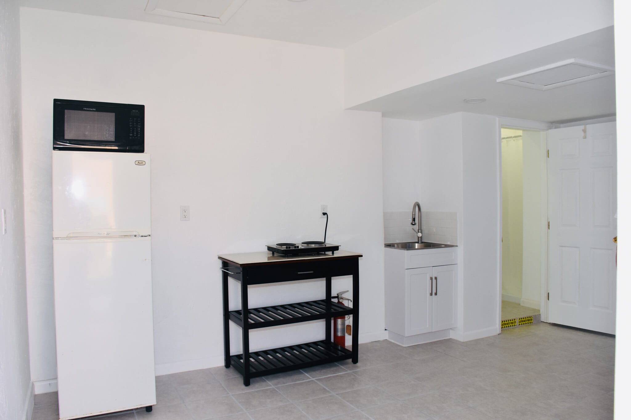 Kitchenette and bathroom door - 851 SW 49th Ter