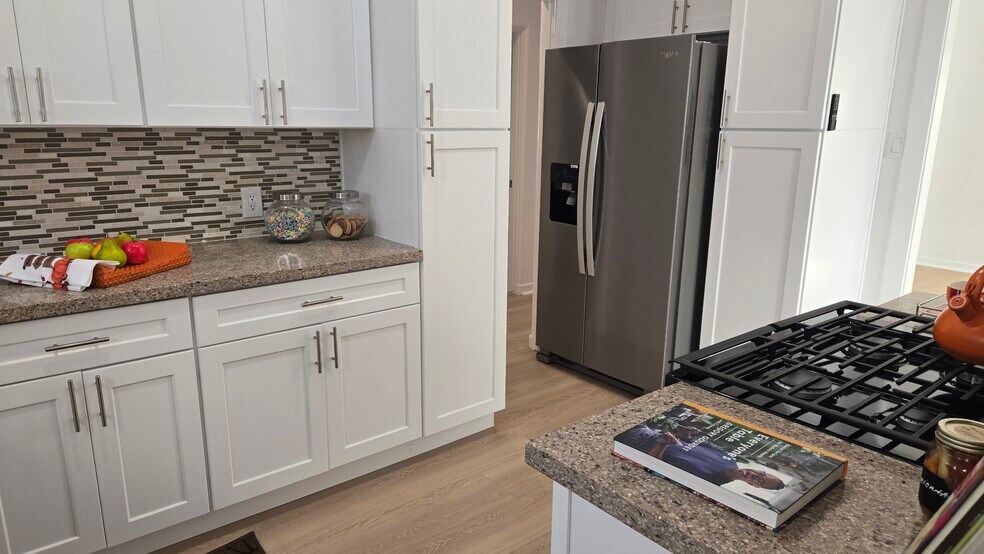 kitchen w/refigerator - 4269 McClung Dr